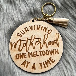 Wood keychain with tassel: Surviving mother one meltdown at a time